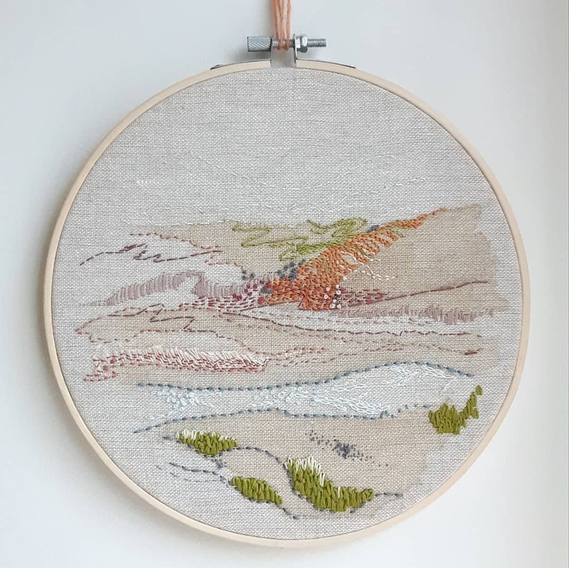 Hand-stitched wall art of a view from a favourite hike, reinterpreted to be an abstract souvenir